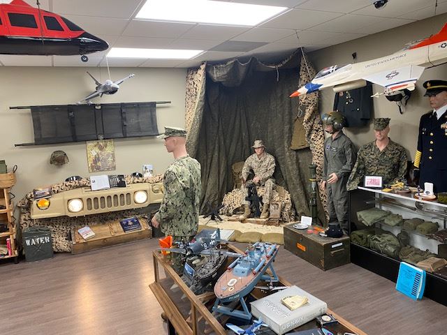 Collection of military items and uniforms